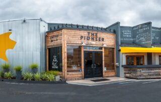 The rustic exterior of The Pioneer BBQ, a top choice for family-friendly dining in Eastlake.